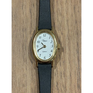 Vintage Timex Cavatina Women's Gold Tone Quartz Watch 18mm White Oval Dial I1